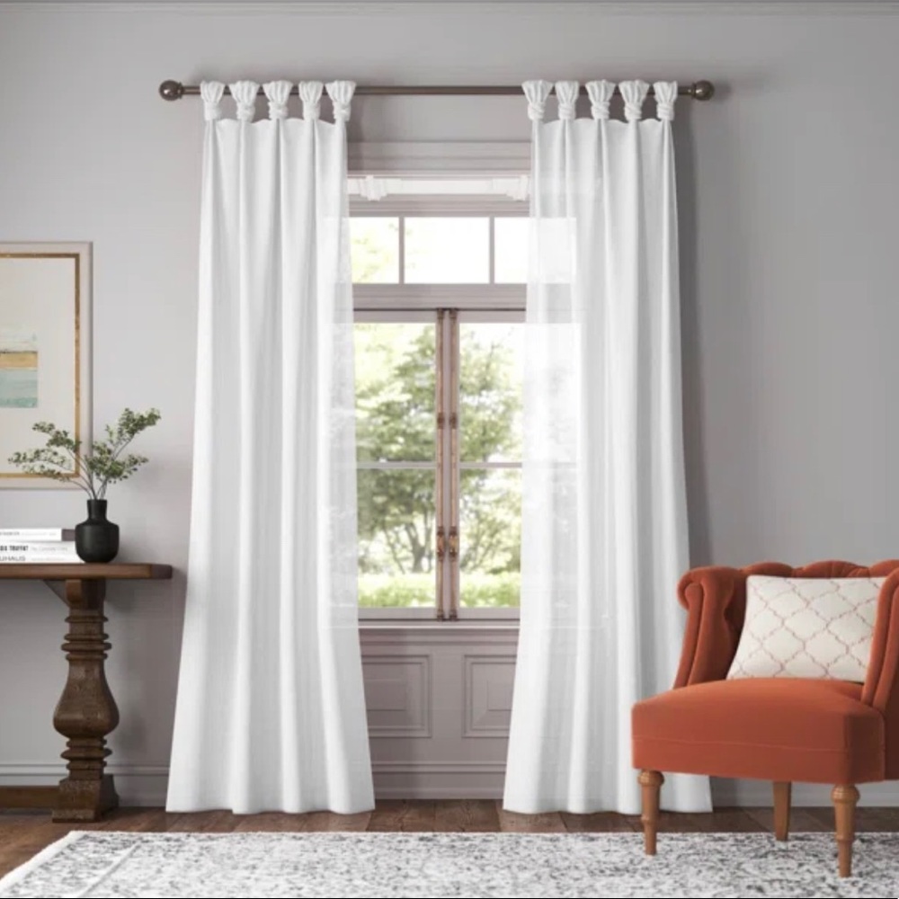 BRAND NEW! Semi-Sheer Tab Top Single Curtain Panel: 50"W x 95"L
Color: White